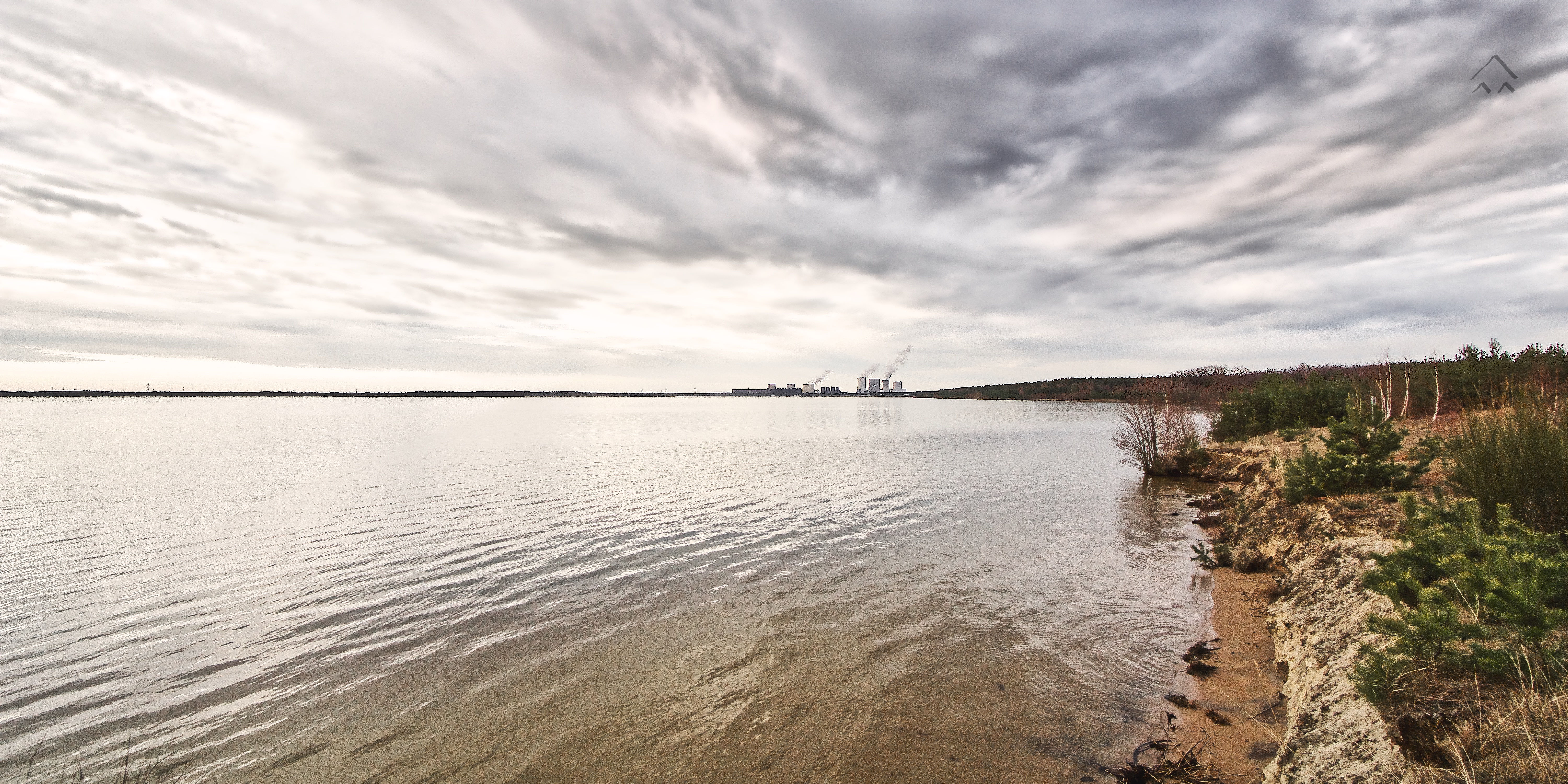 photo of a former open pit mine and a powerplant in Saxony